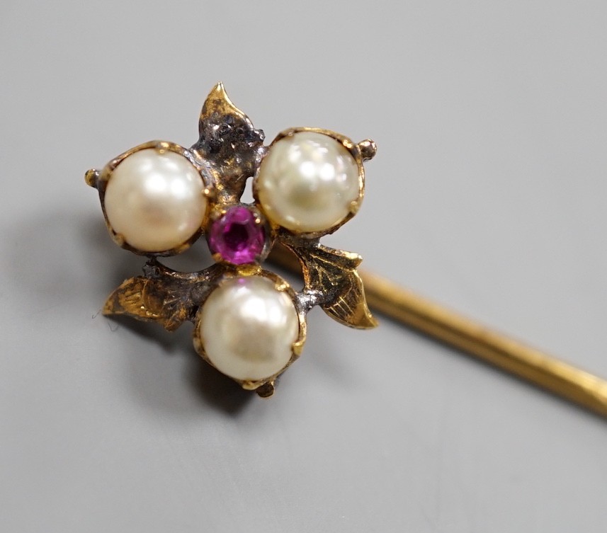 Two unmounted oval white opals, approx. 16mm and a yellow metal, cultured pearl and gem set stick pin.